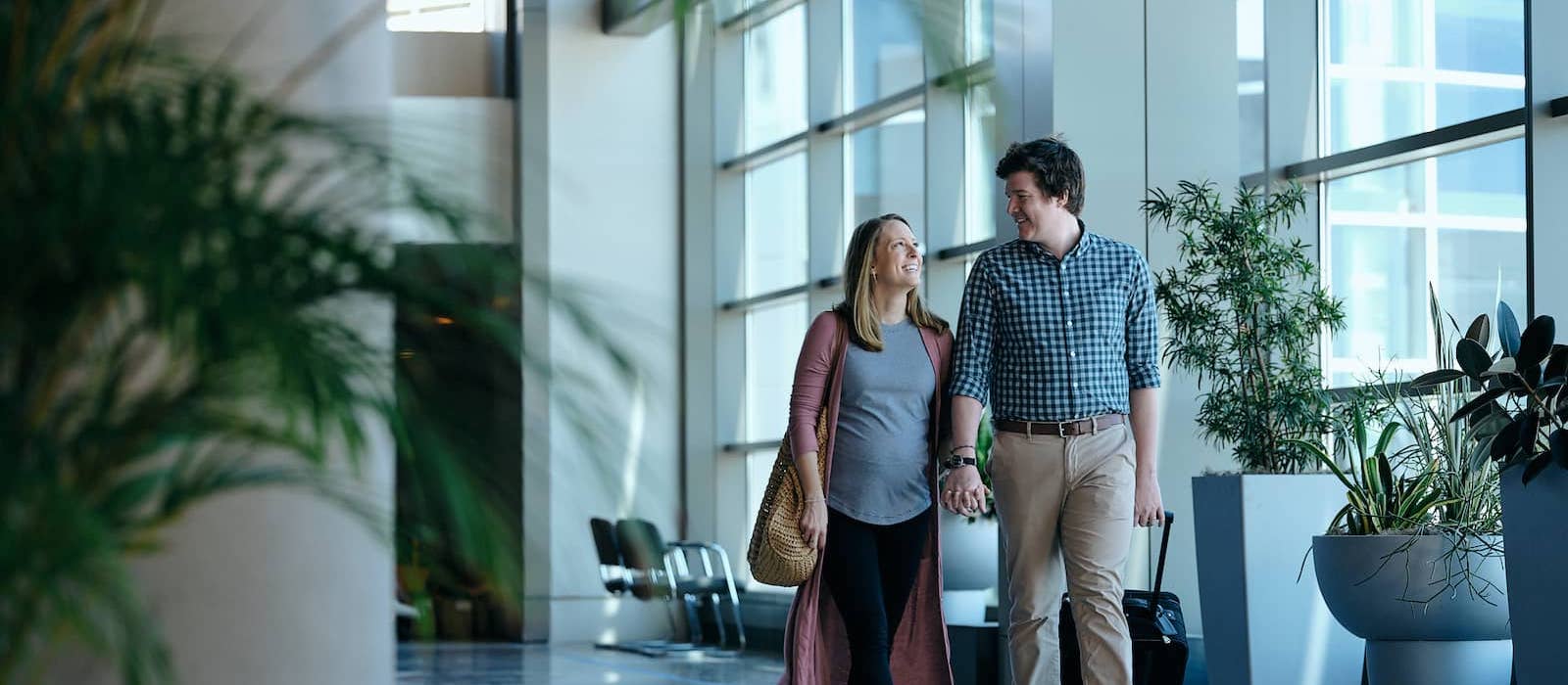 A couple walking in the airport